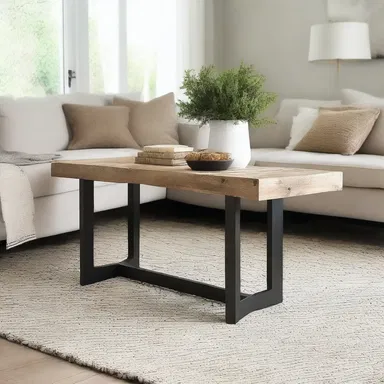 The rustic workhorse table added a touch of charm to the modern interior design of the living room.
