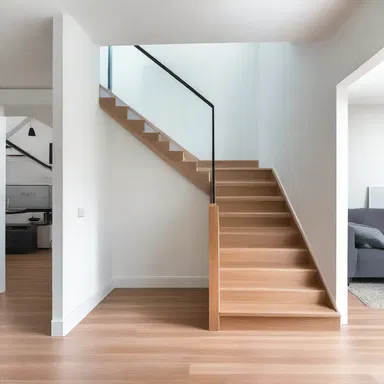 The sleek and modern staircase in the house was designed to hold tight to the wall, creating a stunning focal point.