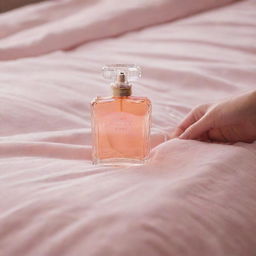 Victoria's Secret perfume bottle elegantly placed on a detailed hand, resting on a well-made bed.