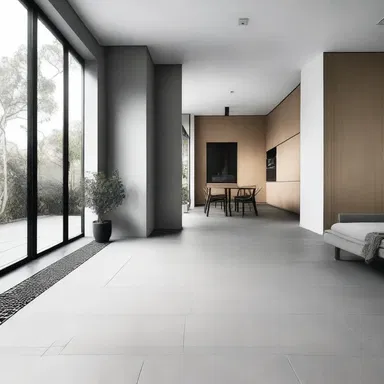 The minimalist aesthetic of the house was complemented by the use of matte tiles on the floor, giving a refined and sophisticated look to the interior.