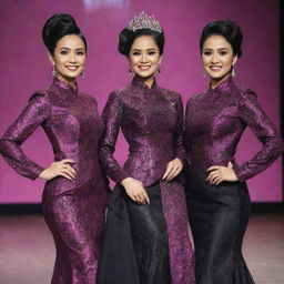 Three Indonesian women, each distinct, with sleek black updo hairstyles, donning unique black fuschia swarovski long-sleeve batik evening gowns. They are poised on a glimmering pageant stage, standing confidently in high heels.