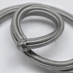 Close-up image of a coiled wire with its free ends wound around the coil to prevent unwinding.