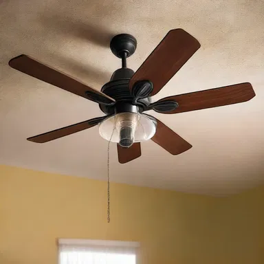 In the haunted house, the eerie whirr of a malfunctioning ceiling fan added to the suspense and horror of the scene.