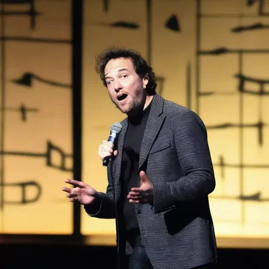 The stand-up comedian told a hilarious joke about a man who got lost longitudinally while time traveling.