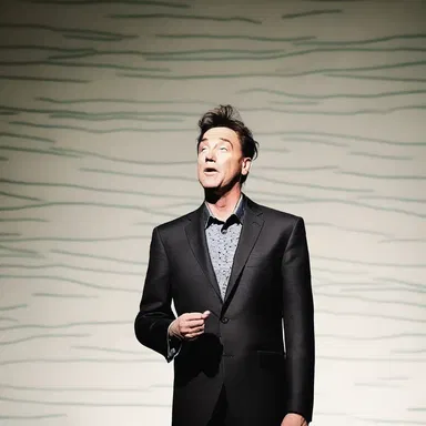 The comedian's clever wordplay went over the audience's heads, leaving them with a tin ear for humor.