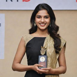 Deepthi Sunaina, dressed in formal attire, holding an award and radiating joy and pride