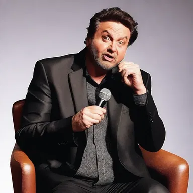 The comedian spit out a sarcastic remark that had the audience in stitches.