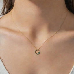 A delicate gold chain necklace with a pendant designed as the Google 'G' logo in its characteristic colors.