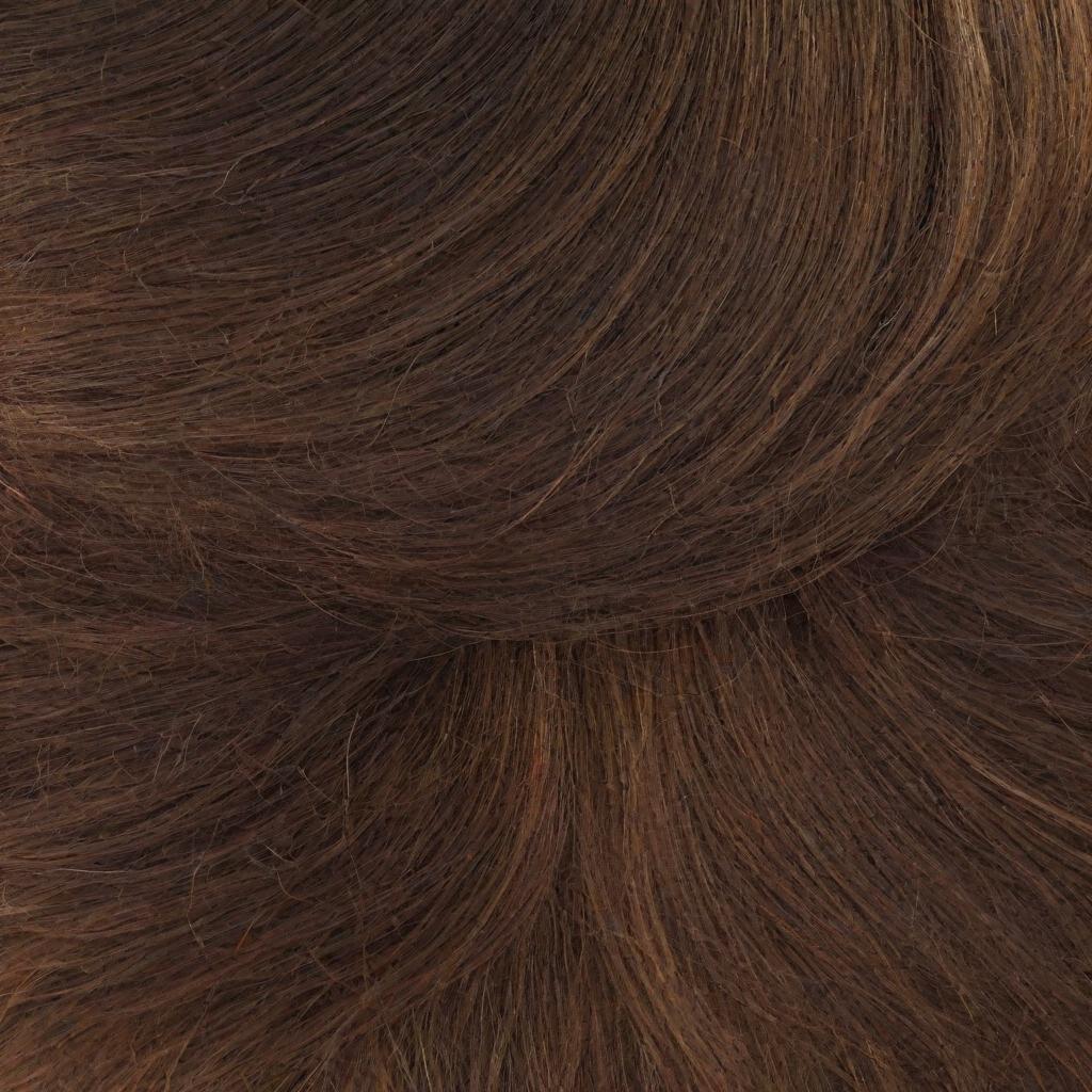 A detailed close-up image of a varied, nicely tamed, and healthy textured hair shining under a radiant light.