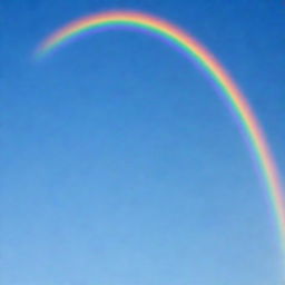 A vibrant, multi-colored rainbow arc stretching across a clear blue sky.