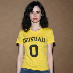 Krysten Ritter wearing a football style t-shirt in bright yellow with the name 'Cristiano' prominently displayed in the center.