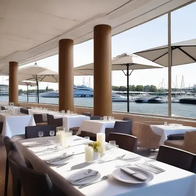 The design of the waterfront restaurant was inspired by the elegance and sophistication of regatta events.