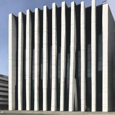 The building's design had a fascistic vibe, with its strong and imposing facade.