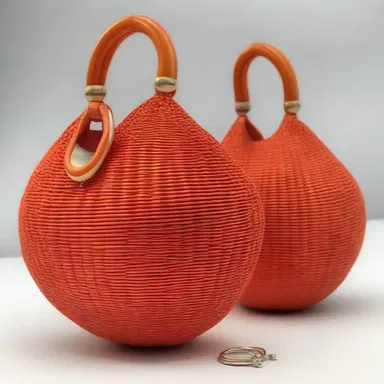 Pod-shaped accessories, such as handbags and earrings, have become a popular trend in the fashion industry, adding a unique and modern touch to outfits.