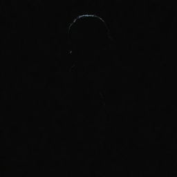 A silhouetted figure against a deep, inky black backdrop.