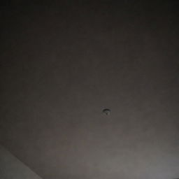 A close-up perspective of a dark and empty bedroom ceiling, seen from one's eye when lying on the side.