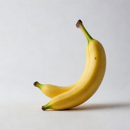 A ripe, vibrant yellow banana with a slight curvature, set against a minimalist white background.