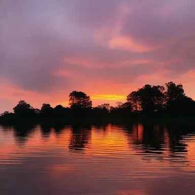 The sun gradually set, robing the sky in shades of pink and orange as if adorning it with a warm embrace.