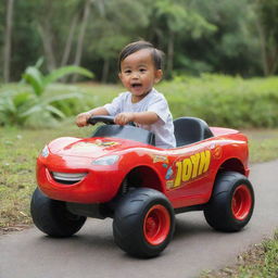 A 3 year old Balinese boy joyously riding a Lightning McQueen car toy amidst a tropical setting