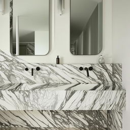 Render a sleek countertop with a modern washbasin. The countertop is glossy marble with hints of grey and white while the basin is a polished white ceramic