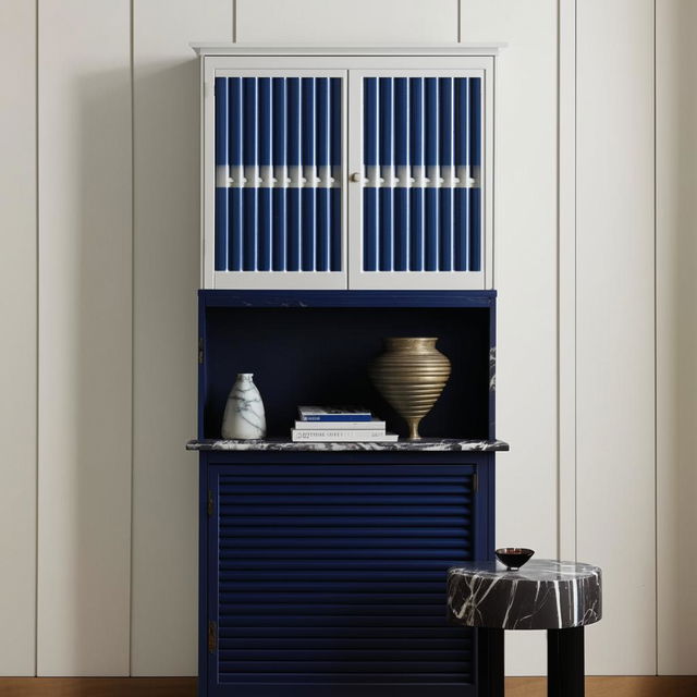 White and blue fluted shutters forming storage unit situated above a black marble side table