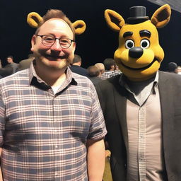 A man wearing glasses standing next to Scott Cawthon, the creator of Five Nights at Freddy's