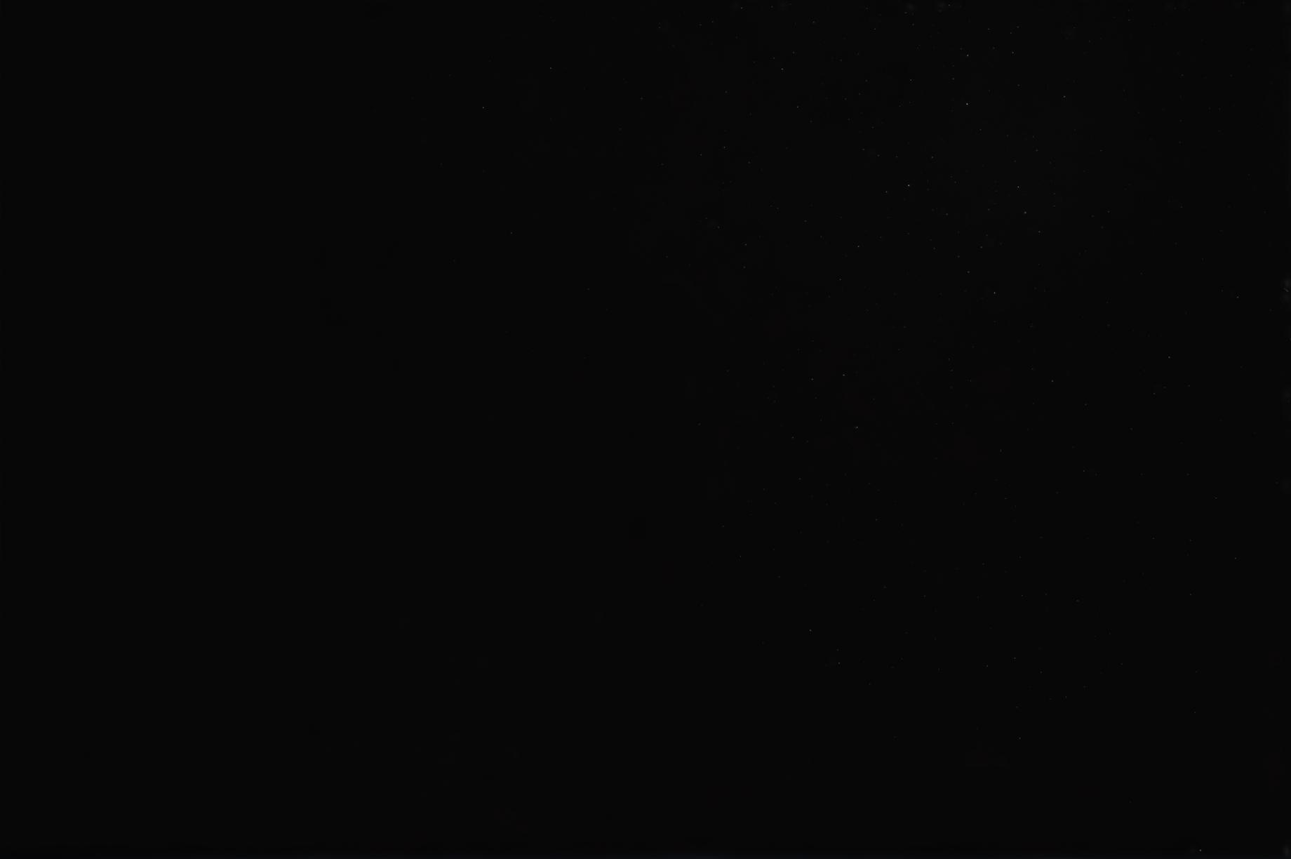 A plain black image with no additional elements or colors.
