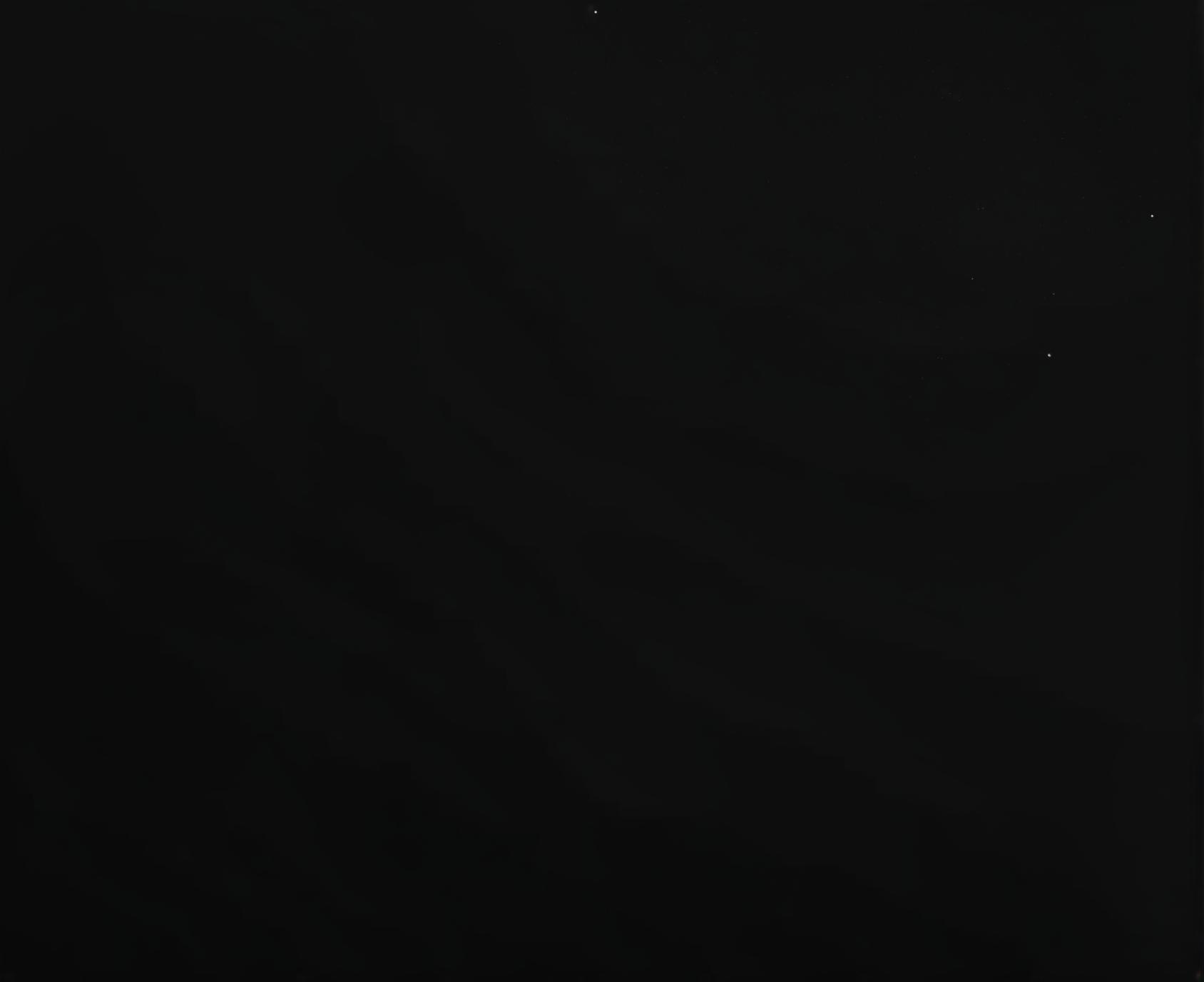 A plain black image with no additional elements or colors.