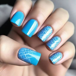 A nail design in sky blue tones, featuring square-shaped nails