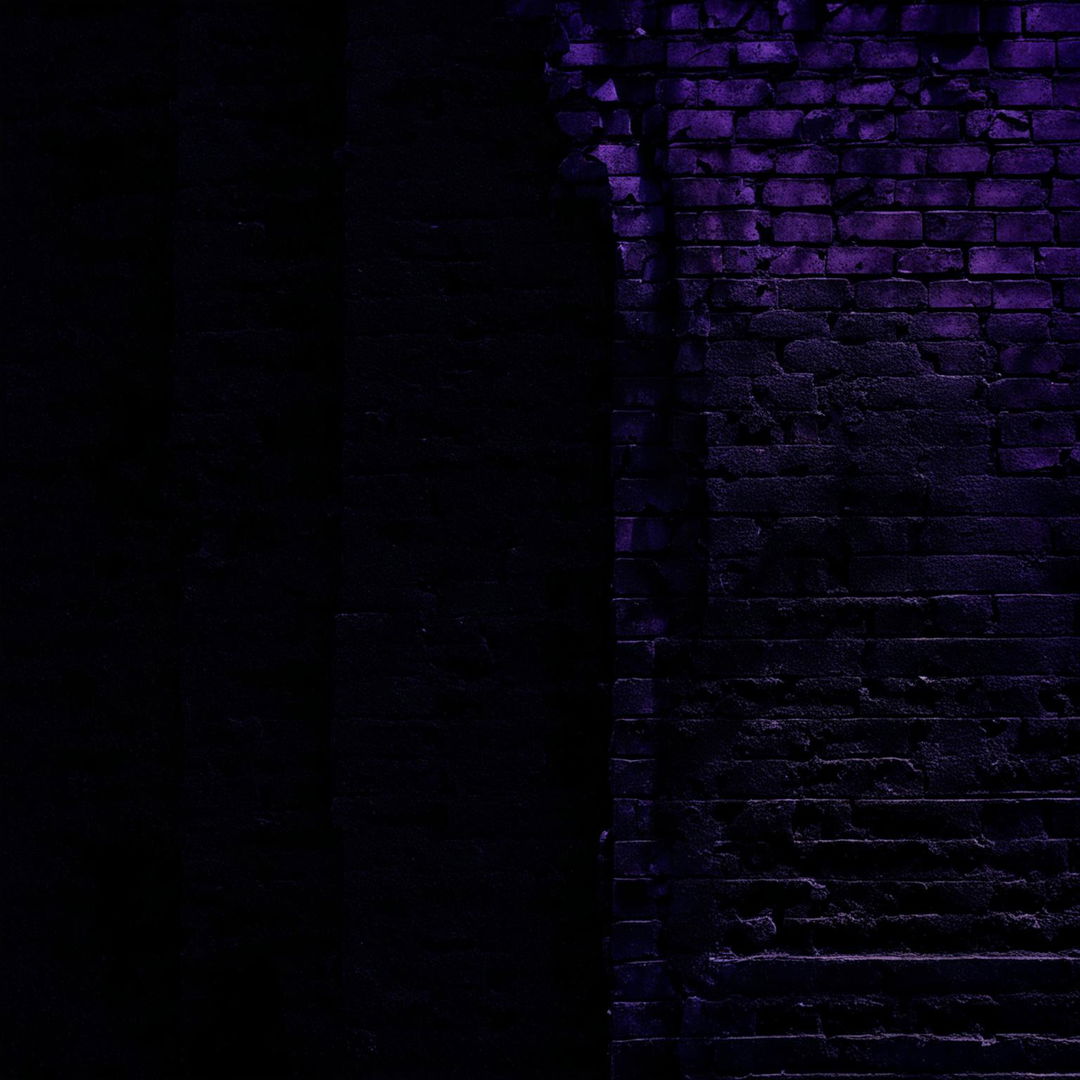 An abstract, dark image of a vintage brick wall background that is broken, cracked, and crumbling, with deep colors and shadowy tones to evoke decay and abandonment