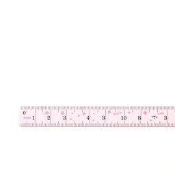 A pretty pink girly ruler designed for measuring in inches, with elegant, feminine design elements intended for a mature audience