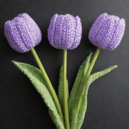 Three crochet tulips in pastel purple color, beautifully wrapped in dark purple