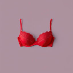 A red bra displayed on a plain background