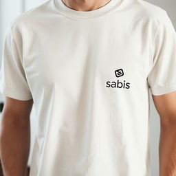 A plain t-shirt with the Sabis logo printed on the left chest