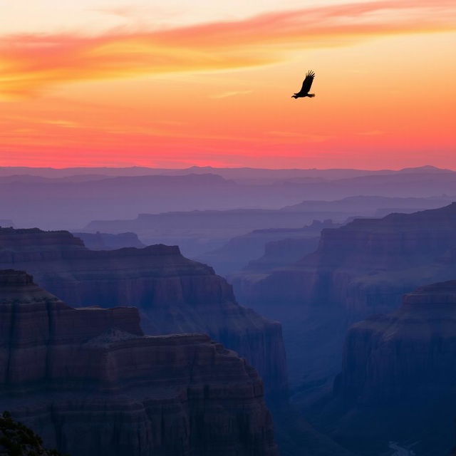 A majestic view of the Grand Canyon at sunset, with vibrant orange and pink hues filling the sky