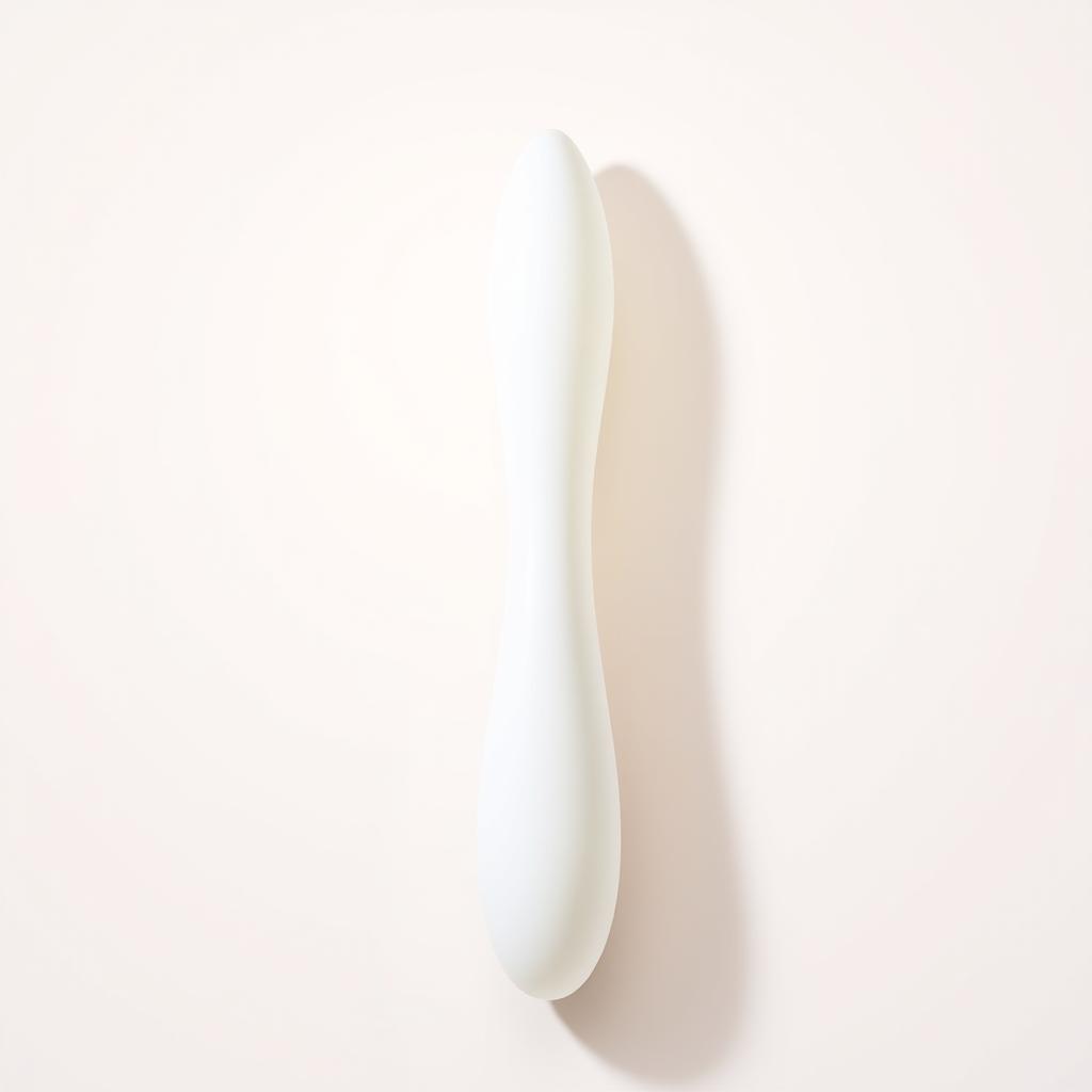 A smooth and sleek dildo made from high-quality silicone, showcasing an elegant, minimalist design