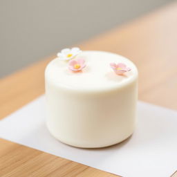 A simple yet charming bento cake, featuring a minimalist design with delicate white icing