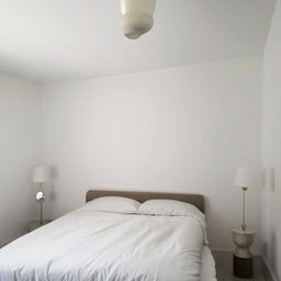 Small bedroom with white walls, white bedding, and minimalistic decor