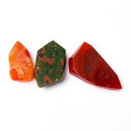 Four exquisite crystals: Carnelian, Bloodstone, Red Jasper, and Madeira, displayed against a solid white background