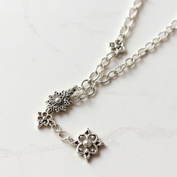 Create a silver chain with intricate fantasy-style design