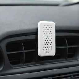 A rectangular car air freshener with perforations, mounted on an air vent