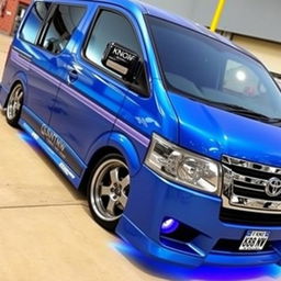 a pimped Toyota Quantum van with a metallic blue finish, prominently displaying the registration plate 'KBN 888 NW'