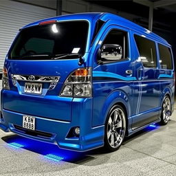 a pimped Toyota Quantum van with a metallic blue finish, prominently displaying the registration plate 'KBN 888 NW'