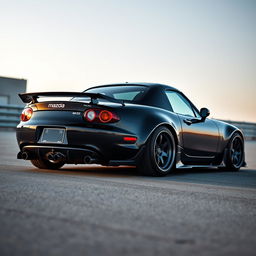 A high-resolution image depicting a second-generation Mazda MX-5 NB in sleek black, modified with a tuning style, captured from a distant perspective