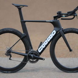 A sleek Cervelo time trial bike, painted jet black, with aerodynamic design.