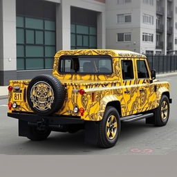 A yellow Land Rover Defender 130 pick-up truck with a full-body wrap featuring a design inspired by the shapes and patterns of a tiger and skull motifs