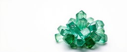 A close-up view of a cluster of emerald crystals resting on a pristine white background