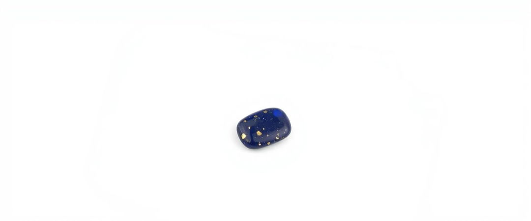 A single piece of lapis lazuli placed on a pristine white background