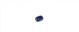 A single piece of lapis lazuli placed on a pristine white background