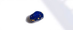 A single piece of lapis lazuli placed on a pristine white background